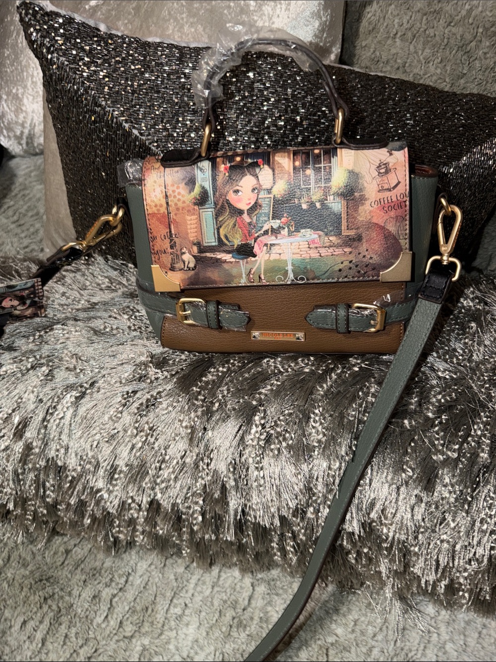 Nicole Lee "Virtual Friend" top-handle satchel featuring a European cafe scene i